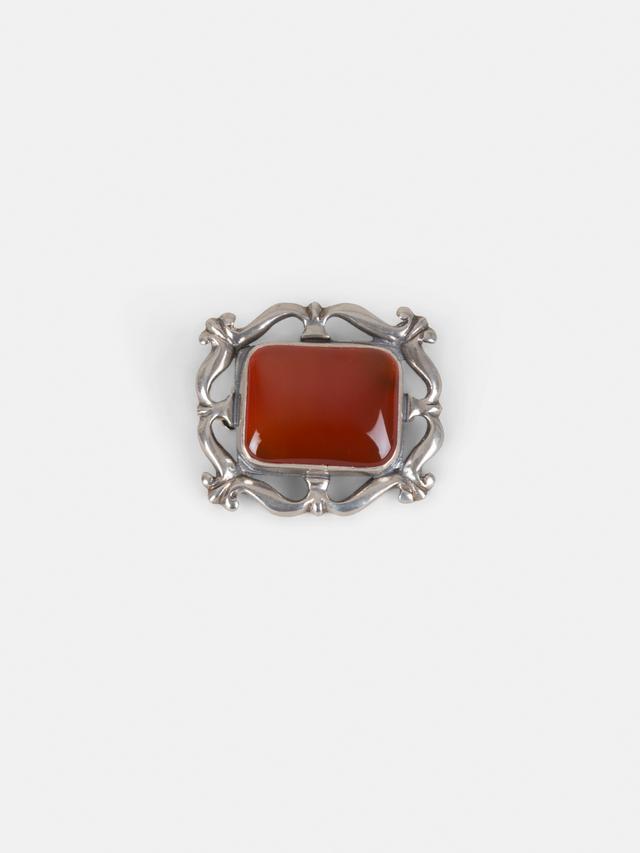 Brooch with carnelian